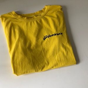 yellow tee